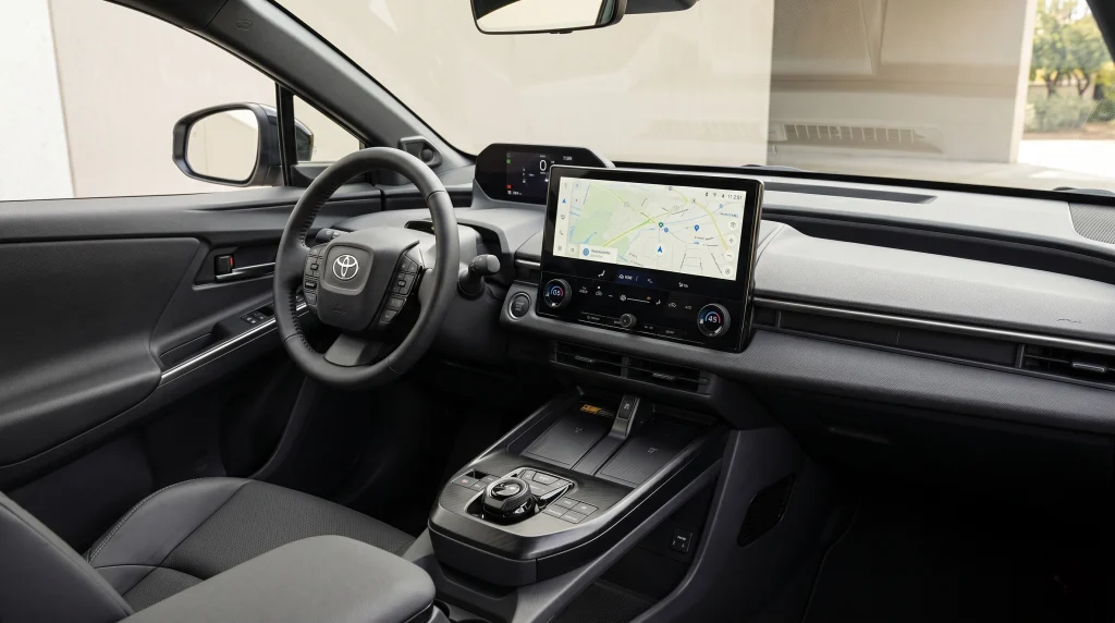 Interior of the 2026 Toyota C-HR featuring a 14-inch touchscreen display, digital dashboard, and modern center console